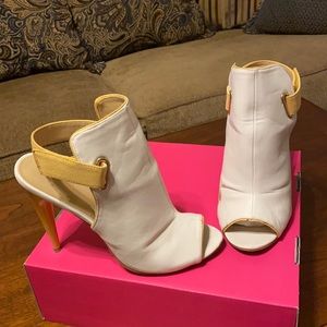 White heels with yellow straps
